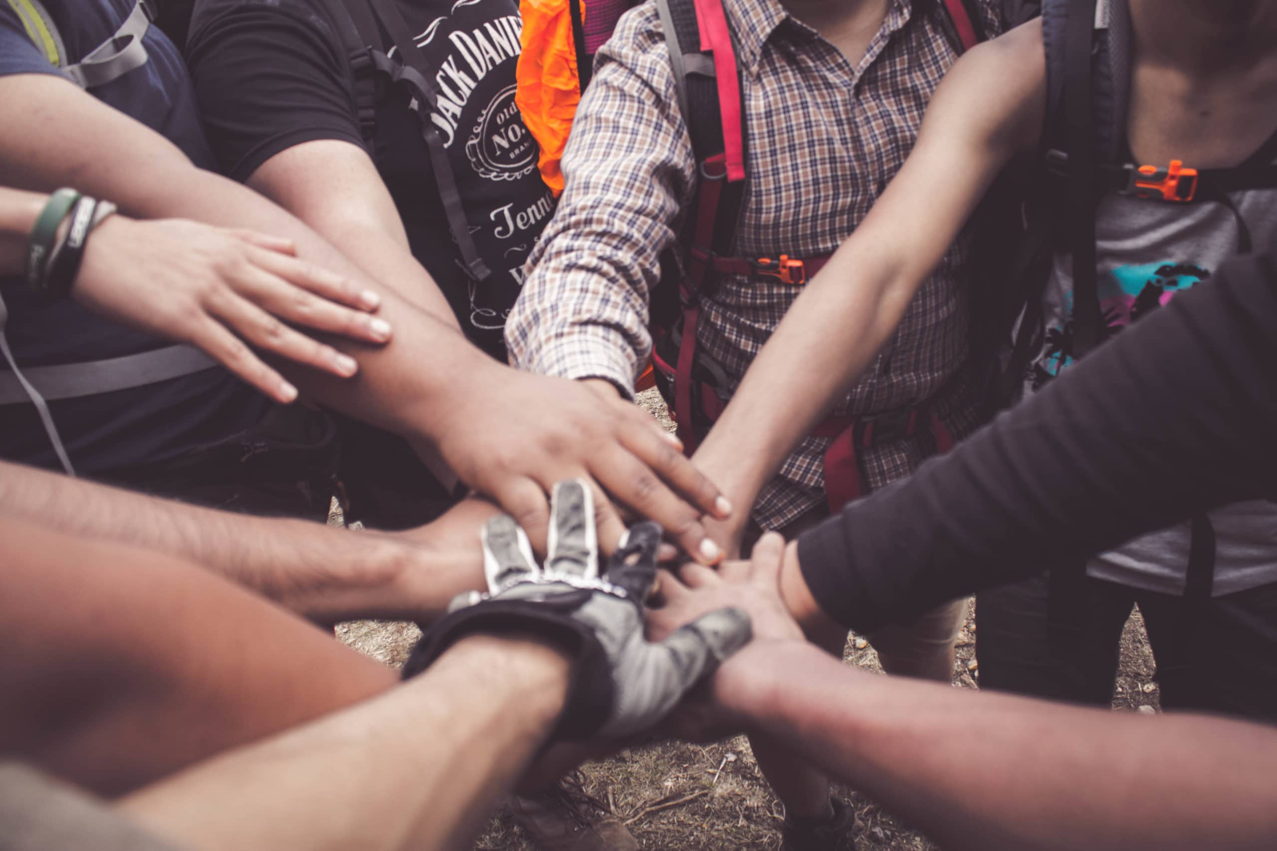 people-doing-group-hand-cheer