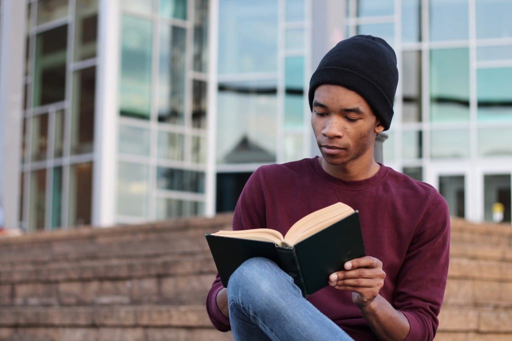 collective-book-club-reading-guy